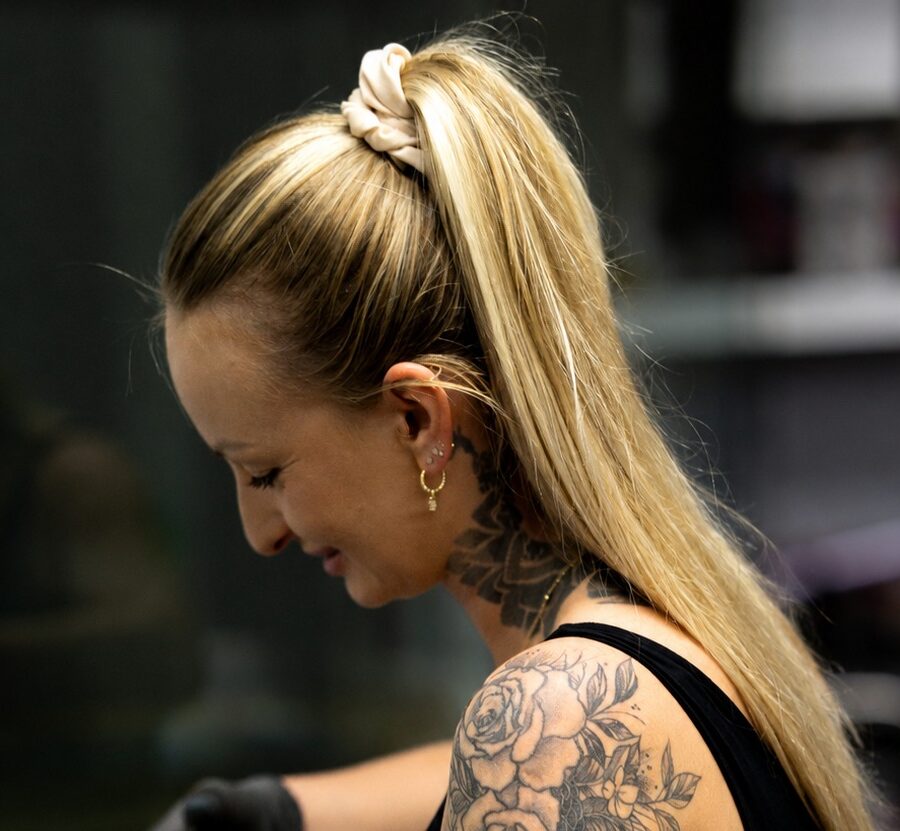 Gabi piercing a client at Hypnotic Art Tattoo Studio, Milton Keynes
