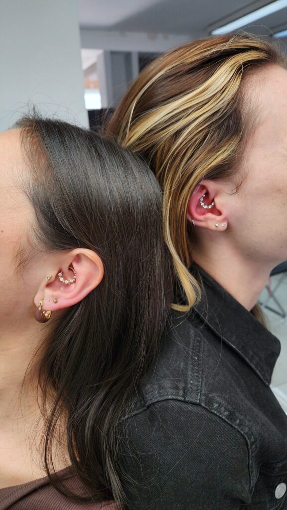 Curated ears — two clients, two builds piercing by Gabi at Hypnotic Art Tattoo Studio, Milton Keynes