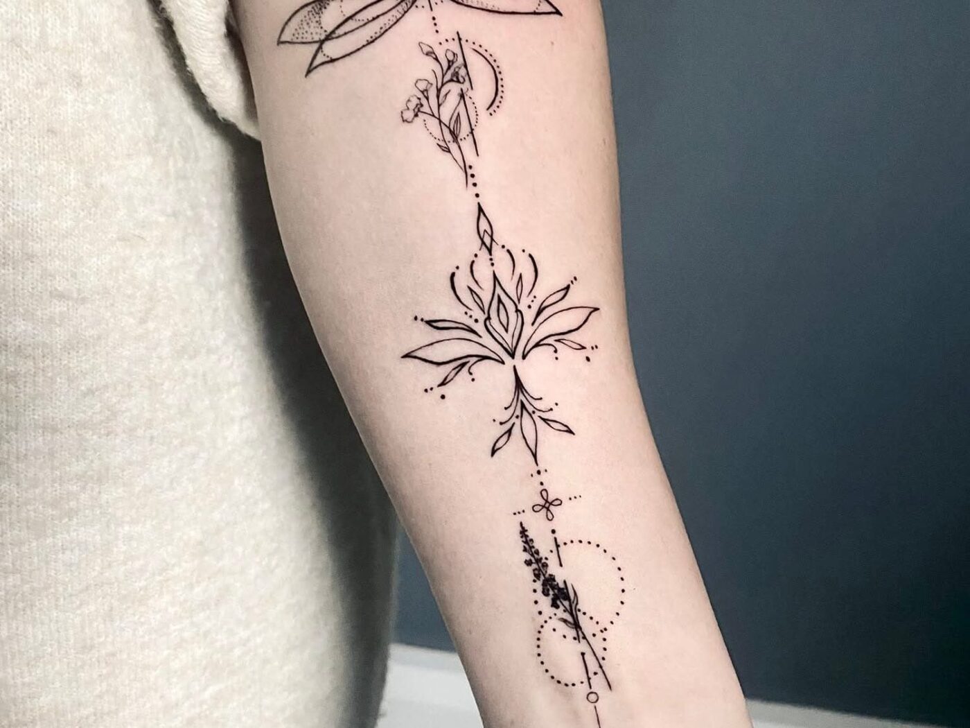 Fine line and mandala tattoo by Hypnotic Art Tattoo Studio, Milton Keynes