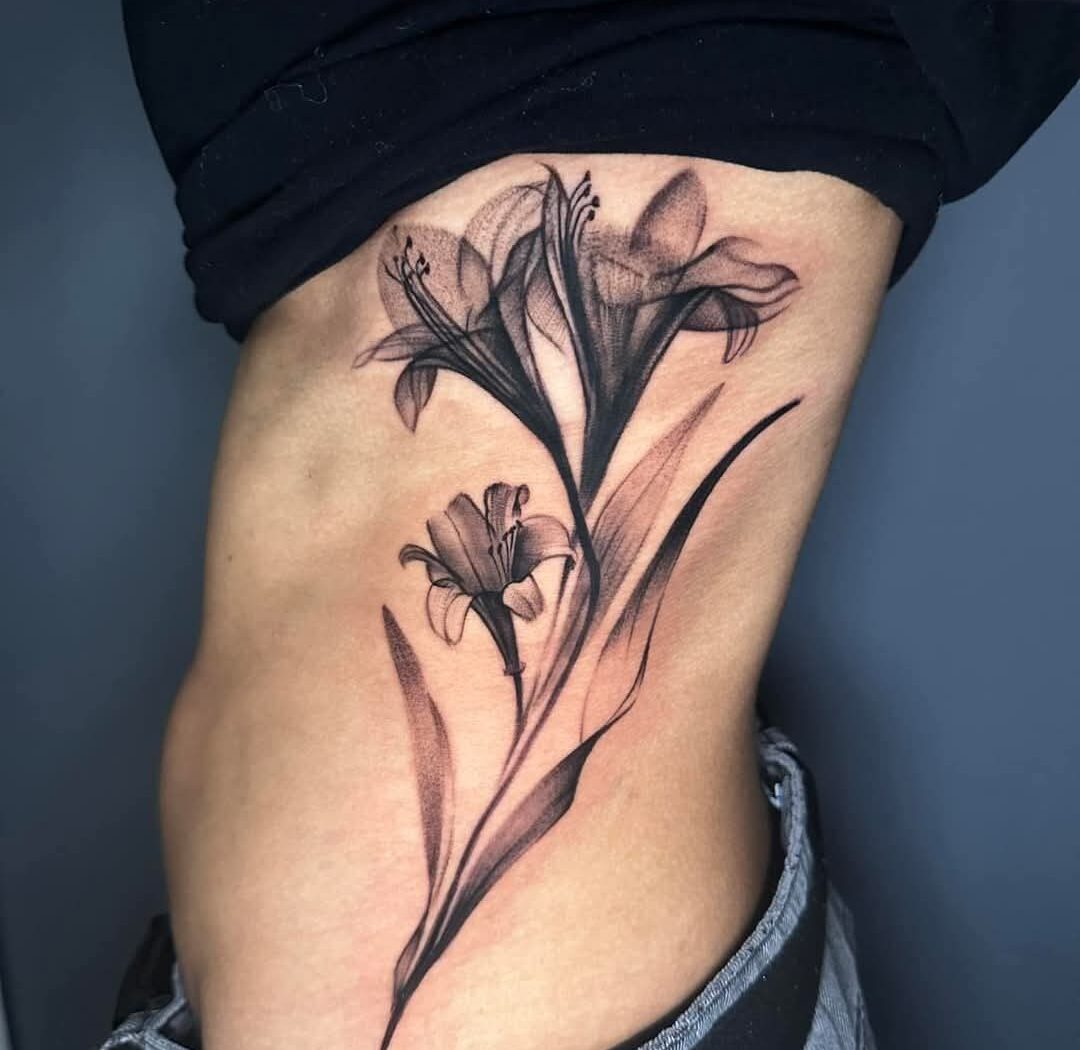 Floral tattoo by Hypnotic Art Tattoo Studio, Milton Keynes