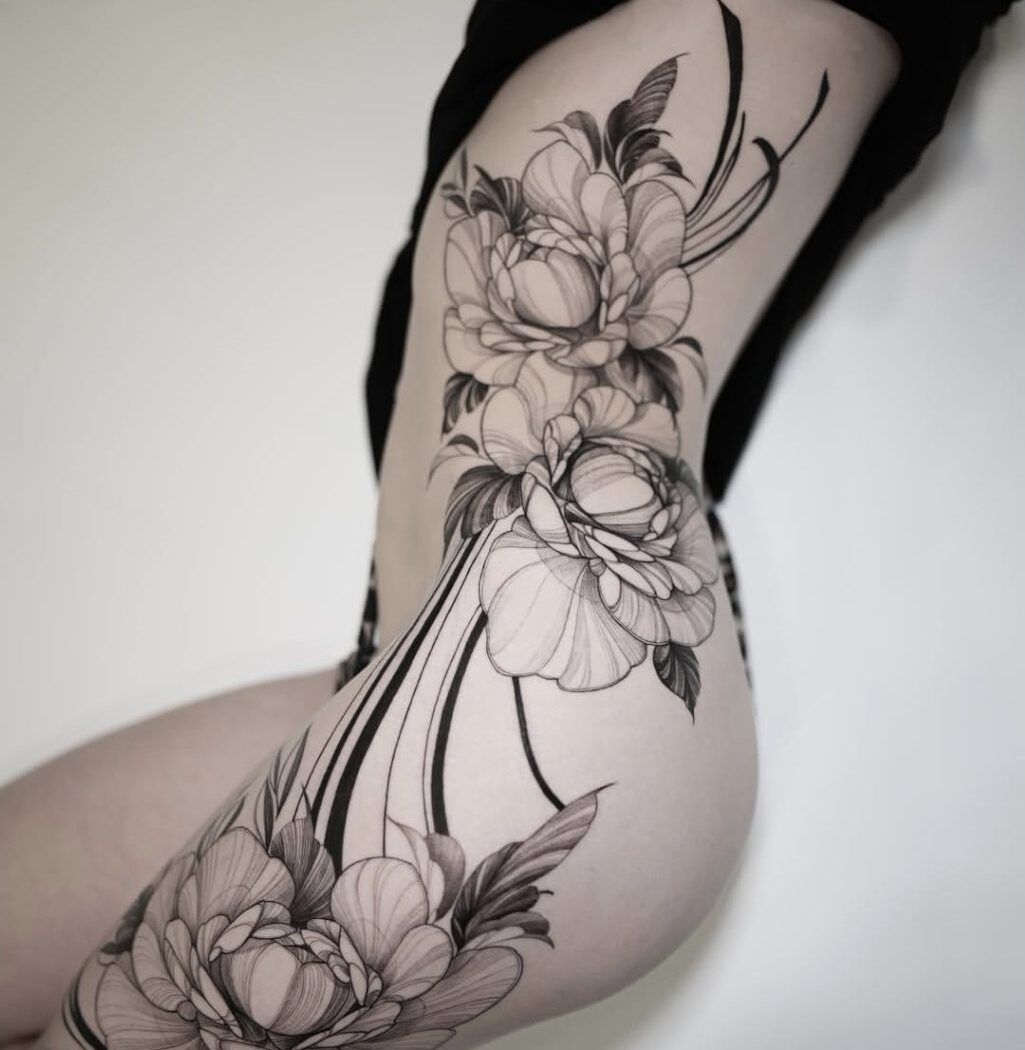 Floral tattoo by Hypnotic Art Tattoo Studio, Milton Keynes
